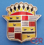 1950 Cadillac Hood Crest and Bezel. Part# 1457110