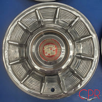 Cadillac Parts & Restoration offers this set of 1957 Cadillac wheel covers/hub caps for sale.